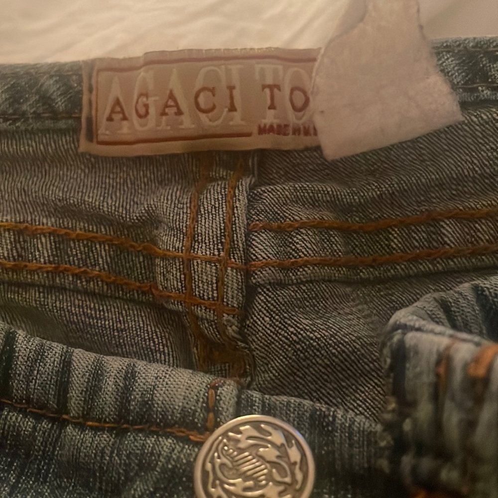 Size 3 low rise denim flared trousers. Great fit!